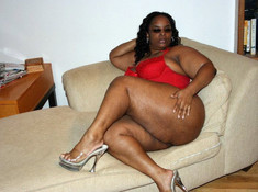 Rough black whore exposes her huge..