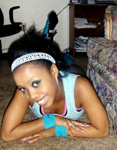 Big-tittied black teen gets naked and..
